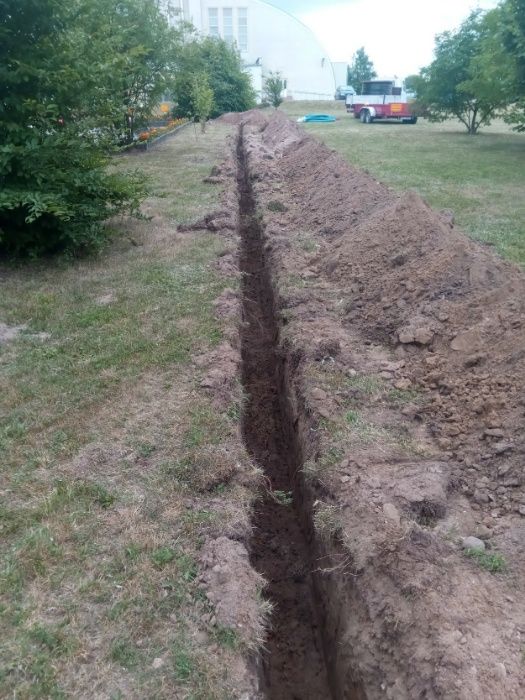 Przecisk kretem, minikoparka, prace ziemne, światłowody