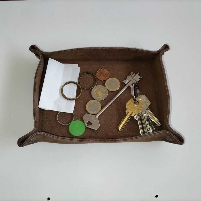 Despeja bolsos em pele de qualidade