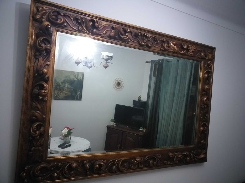 Espelho antigo em talha dourada