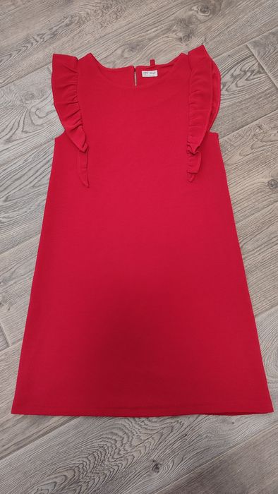 Бежеві штани палаццо