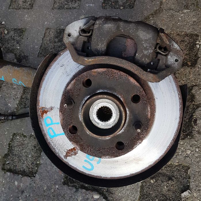zacisk jażmo klin tarcza klocki hamulce przednie uno panda marbella