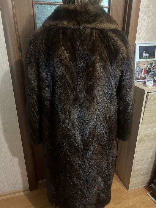 Норкова шуба шита полосами