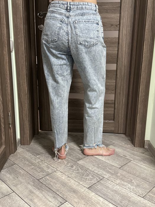 Джинси блакитні, порвані