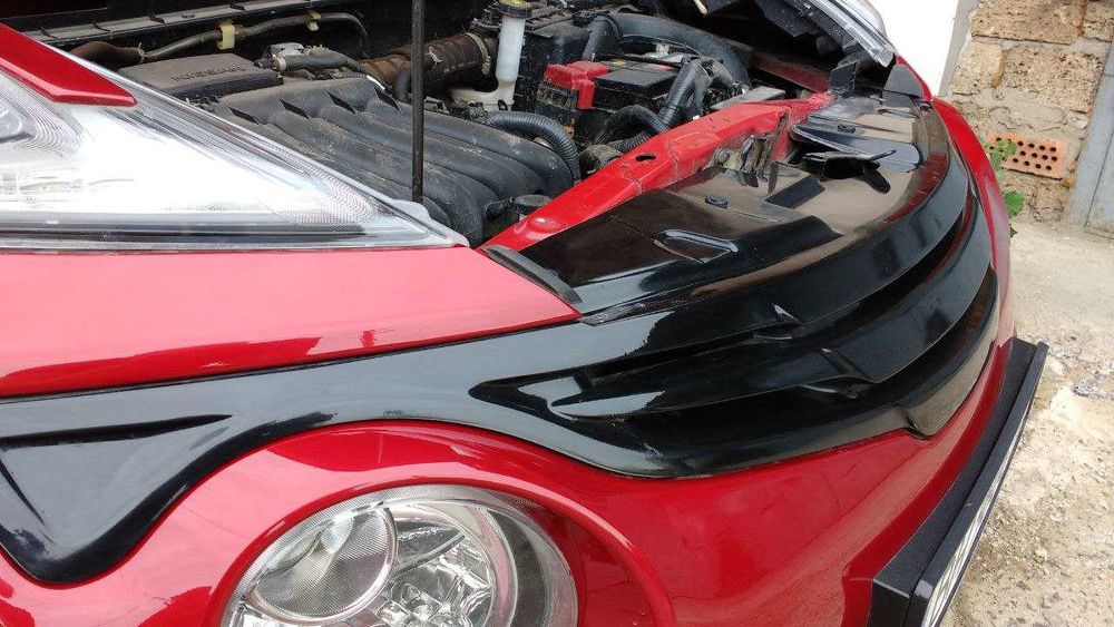 Тюнінг Nissan Juke - накладки бамперів, спойлери, решітка, пороги