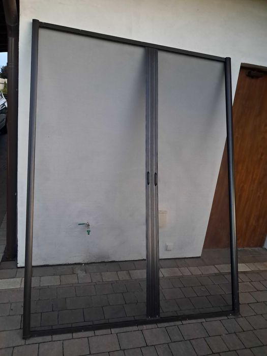 Moskitiera drzwi tarasowe używana
