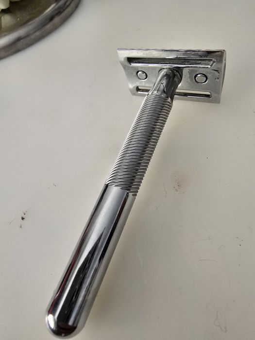 Máquina de barbear King G. Gillette.
