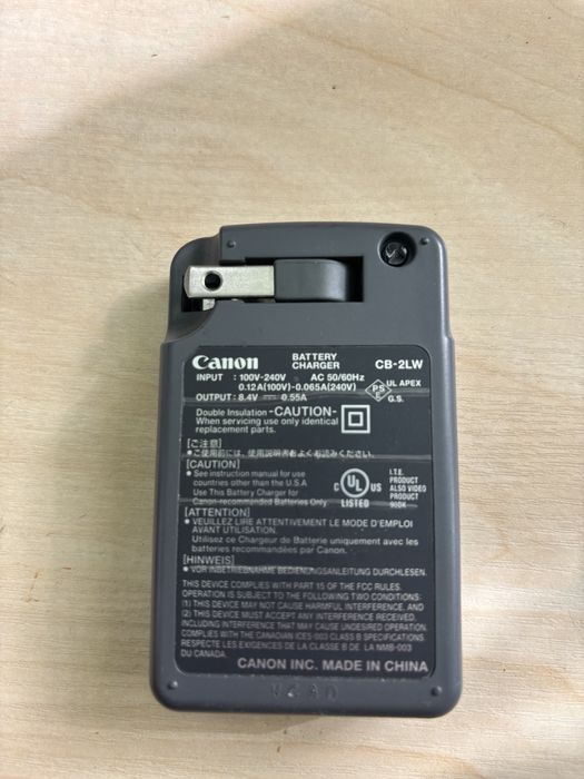 Зарядний пристрій  Canon