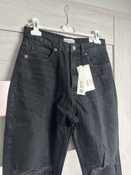Spodnie jeansowe z przetarciami zara m