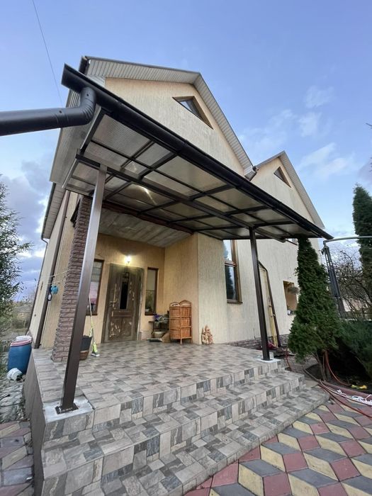 Навес автонавіс навіс над терасою монтаж під ключ