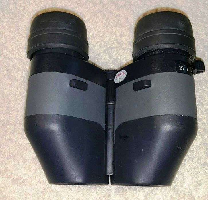 Бинокль Tasco Futura-LE 7x-15x25.