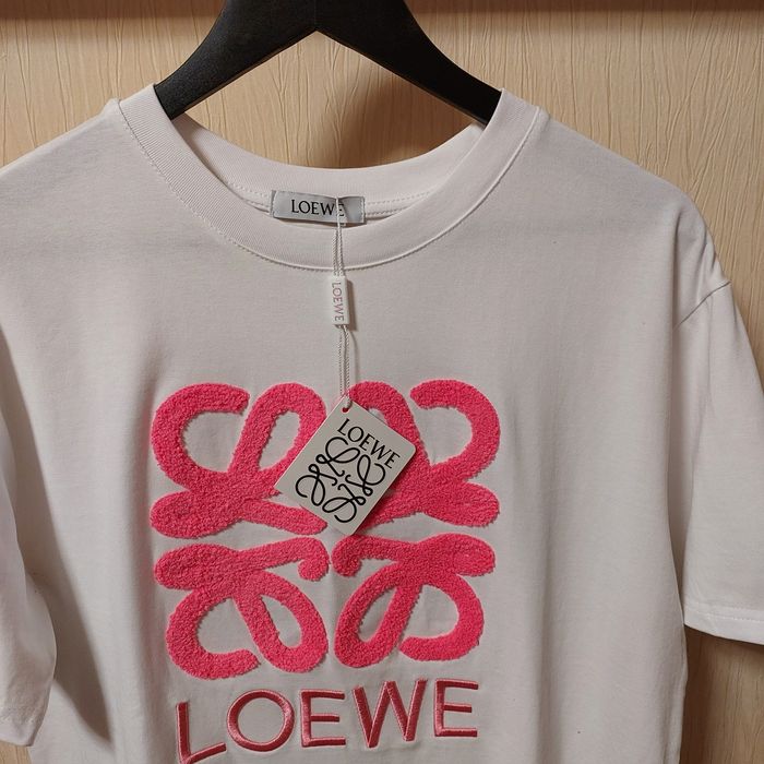 Футболка жіноча в лозмірі м-л.