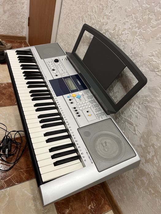 Yamaha E 323 Офіціал.
