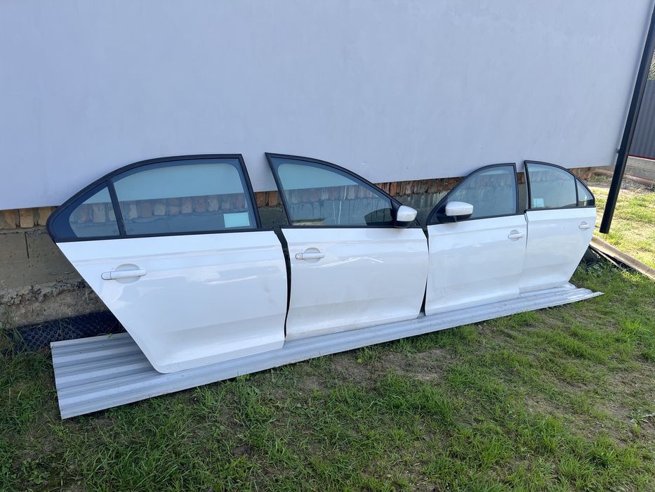 Двері шкода Рапід Skoda Rapid