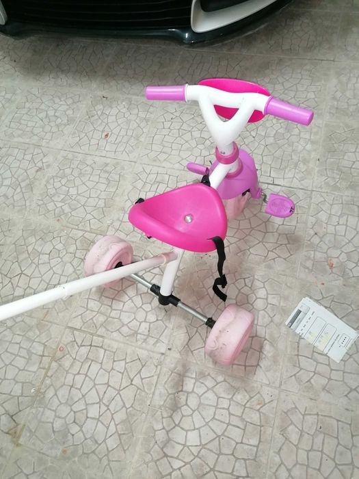 Triciclo de menina