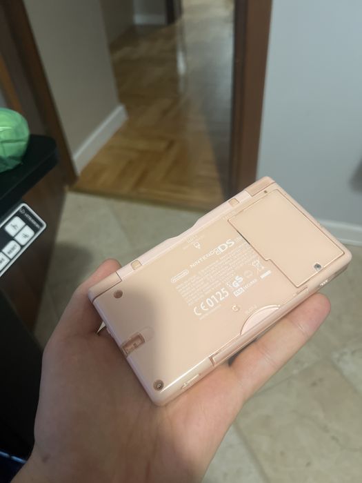 Nintendo DS Lite różowy + 9 gier ładowarka case