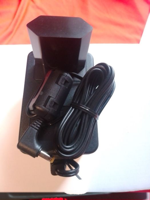 Оригинальный блок питания Icom BC - 149D(6V, 1000mA) новый . Цена 350гр.