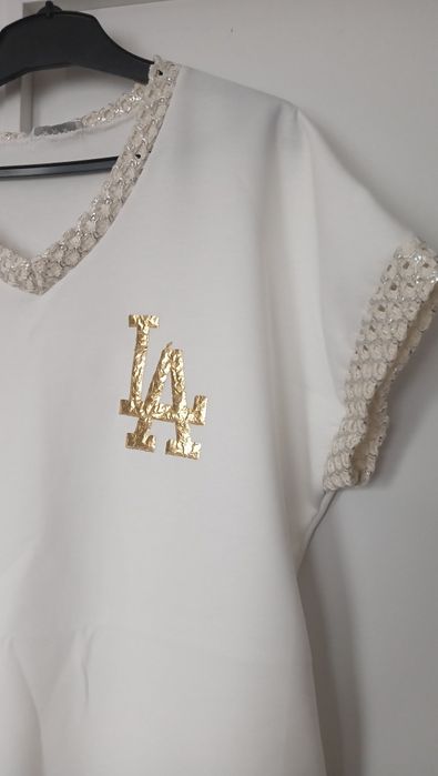 Śliczna nowa sukienka masełko 42-48