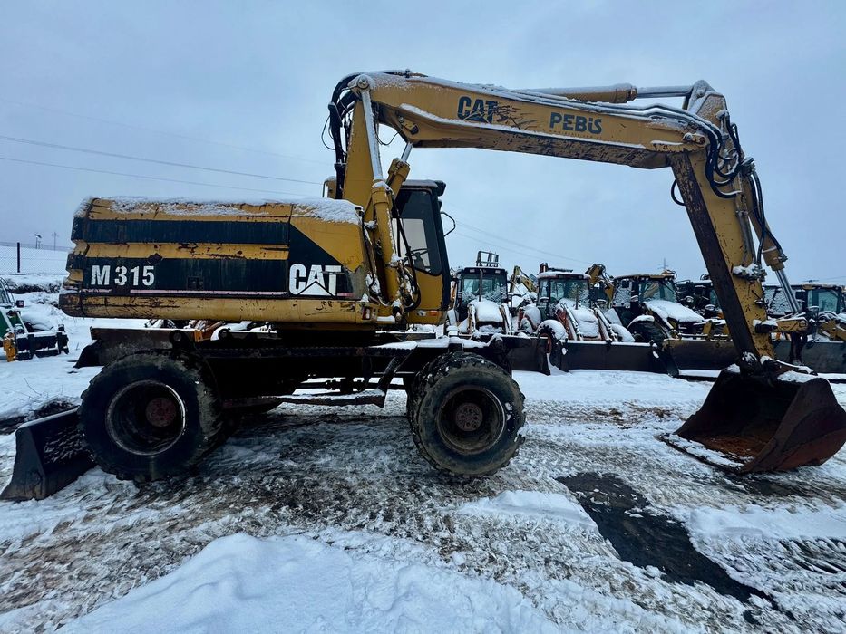 Caterpillar M315* KOPARKA KOŁOWA CATERPILLAR M 315* Leasing* Zamiana* Skup*  Koparka kołowa CAT M315 * CATERPILLAR M315* CAT M315C* Ramię 3xłamane