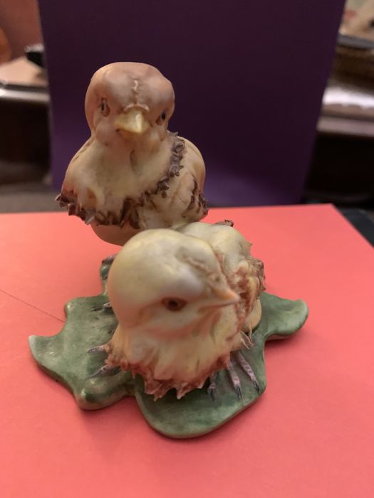 Estatueta de pássaros