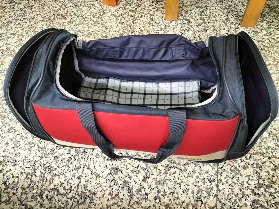 Saco de viagem Gabol azul e vermelho