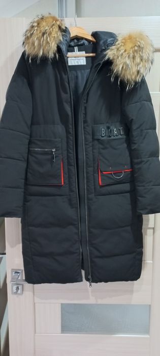 Продам пуховик жіночій