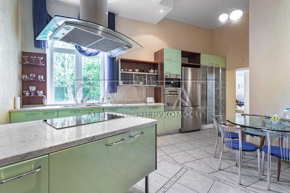 Будинок 2 поверхи/460м2/16 соток в Петропавлівській Борщагівці