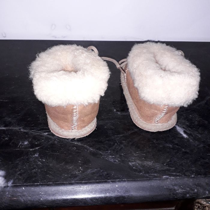 Pequenas pantufas para bébé ou para decoracao