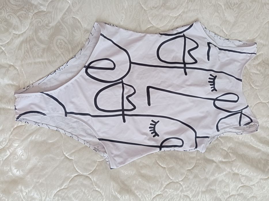 Купальник( новий)44-46р.