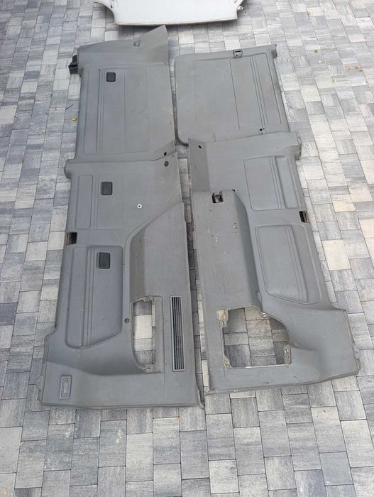 Boczki tapicerki VW T5 Caravelle long