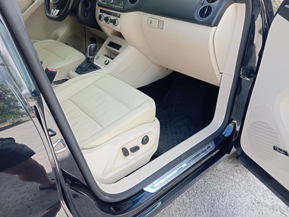 Volkswagen Tiguan 2014 VIN WVGAV7AX4FW009831 фото оголошення 10 з 24