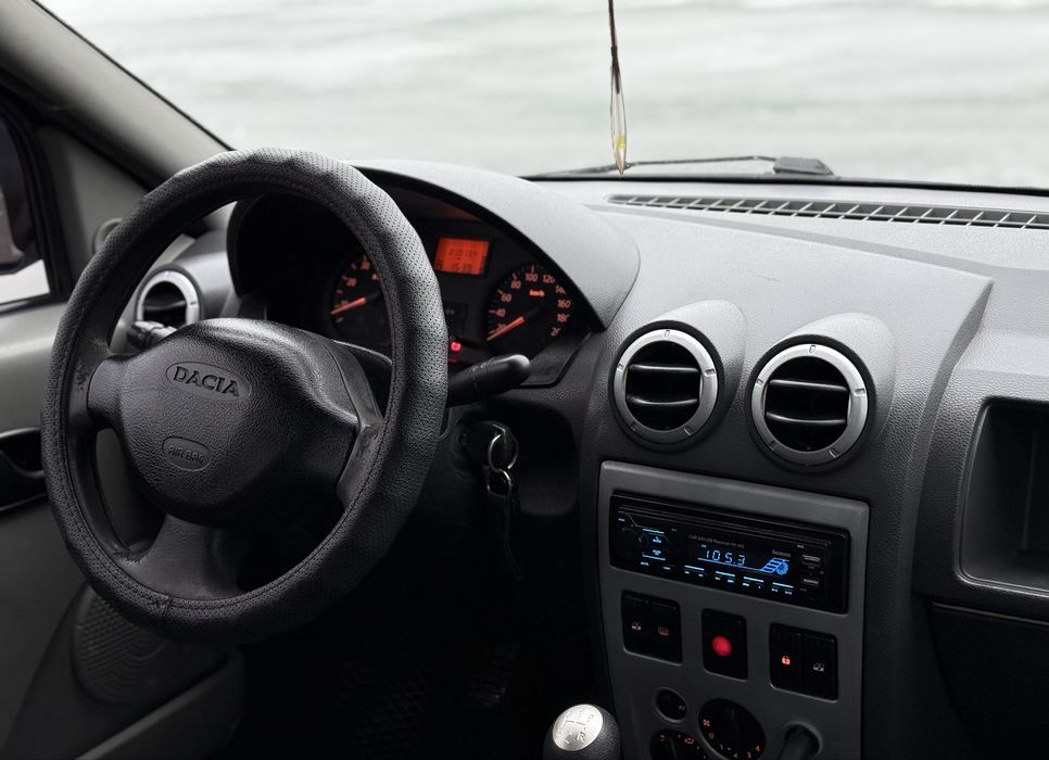 Dacia Logan 1.6 MPI Laureate газ/бензин