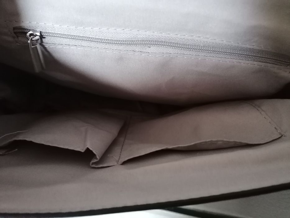 Nowa listonoszka większa z metką