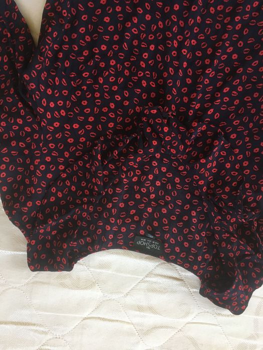 Жіноча блуза з рюшами