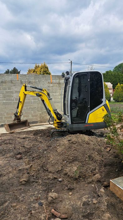 Usługi Minikoparką 1.8t i Koparko-Ładowarką