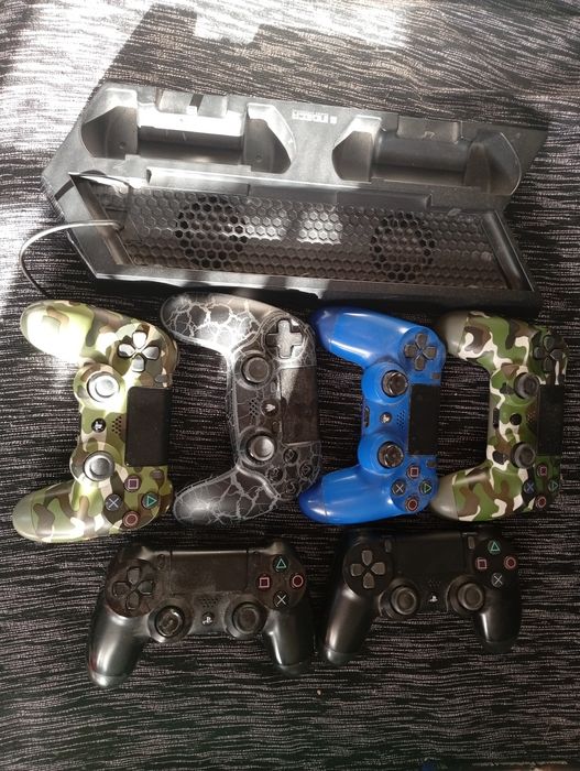 PS4 usada com base e comandos e jogos