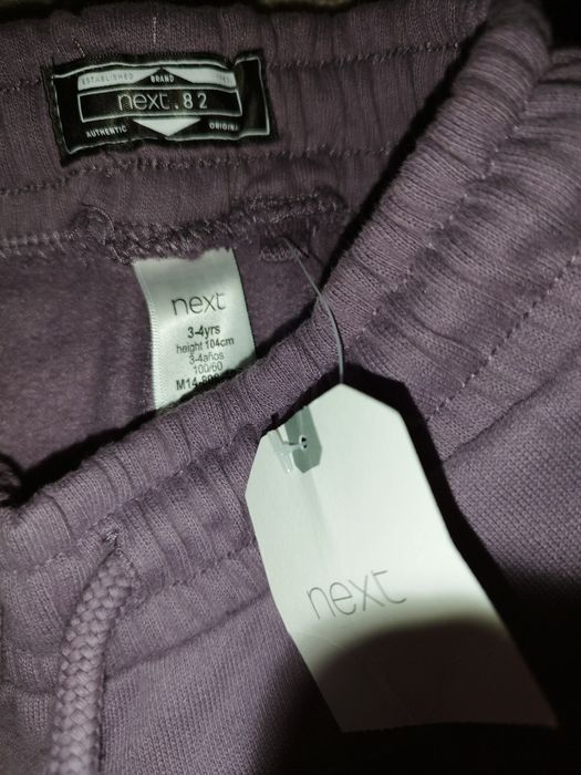 Spodnie dresowe dziewczęce 104 next fioletowe