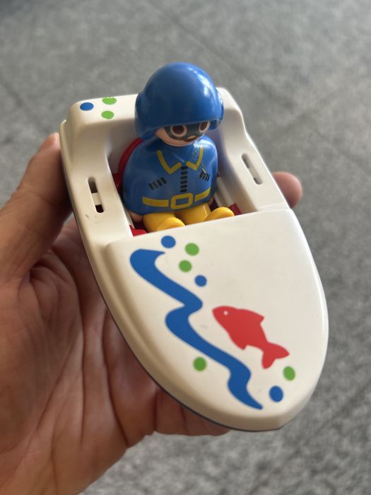 Boneco e barco Playmobil antigo made in germany