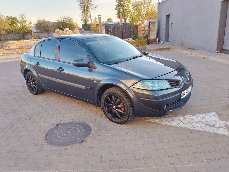 Меган 1.6 бенз. Автомат