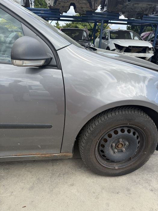 Błotnik Volkswagen Golf V LA7T lewy prawy przód