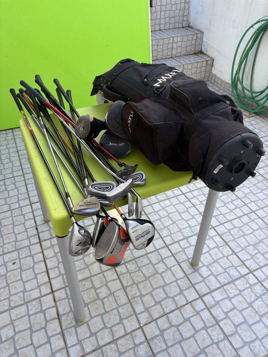 Tacos de golfe com saco transporte em bom estado