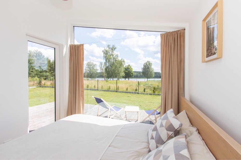 Domek letniskowy z widokiem na jezioro Spore