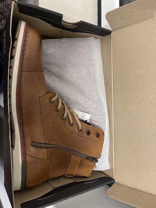 Botas em pele - Novas