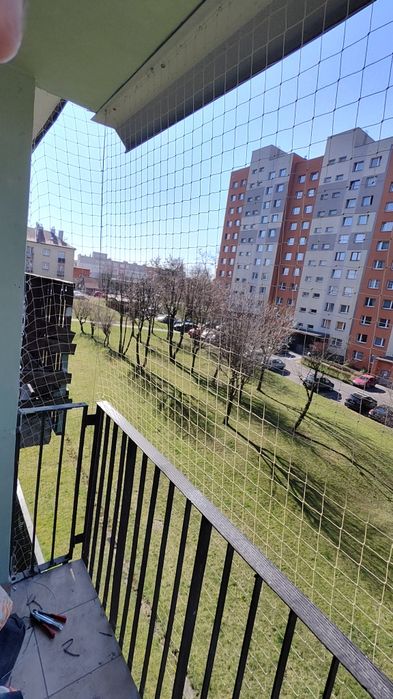 Montaż siatek na balkonie, zabezpieczenie dla kotów, siatki na gołębie