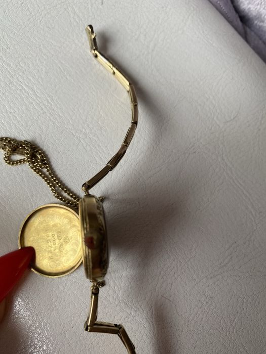 Золотые часы фирмы( пара)