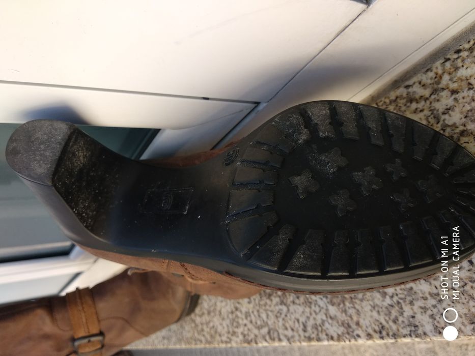 Botas tacão em pele