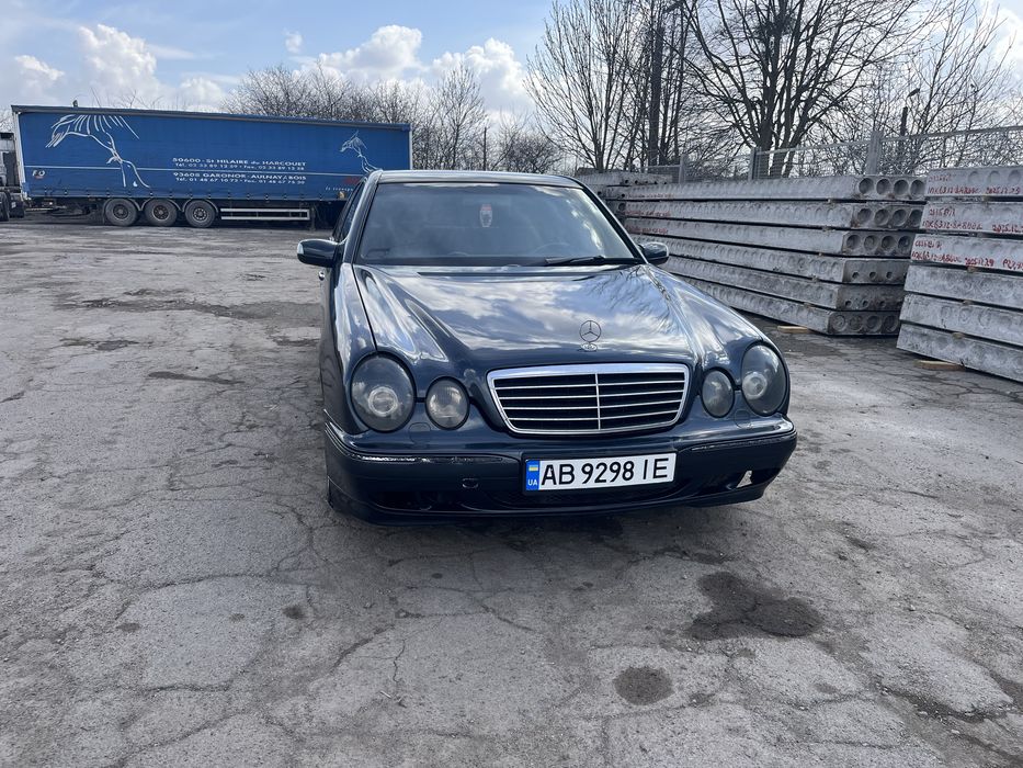 Мерседес Бенз 210