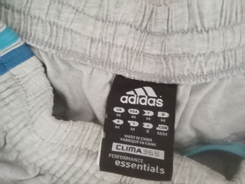 Calçoes cinzentos adidas