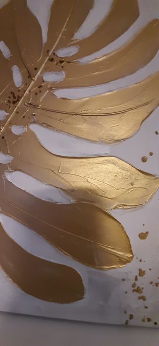 2 obrazy , zloty liść monstery