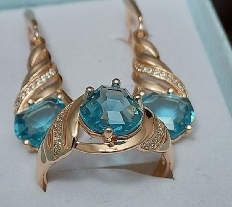 Pierścień Różowe złoto 585 czerwone oczko x 2 + komplet biżuterii