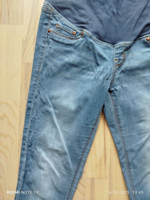 Wygodne niebieskie przecierane ciążowe jeansy dżinsy spodnie jeansowe